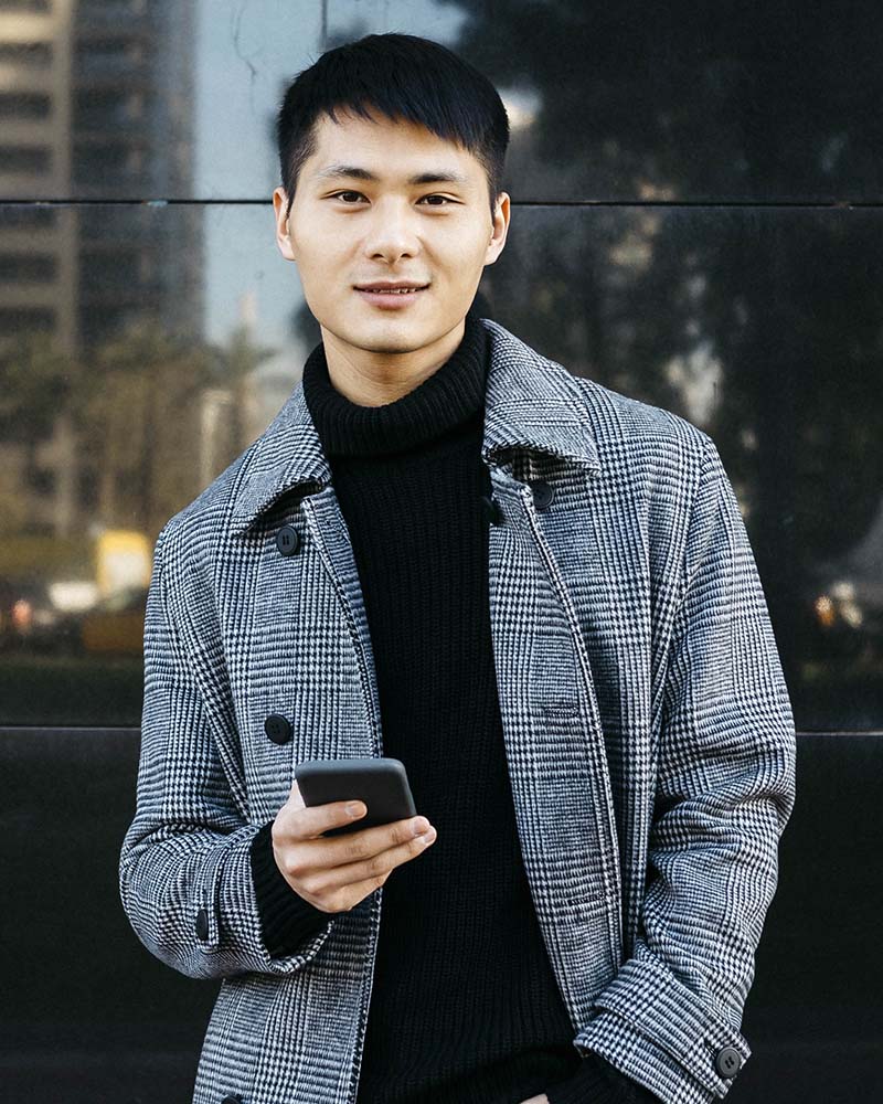 spain barcelona portrait of young man with cell MGKFHQD